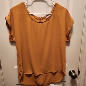 pink rose mustard yellow shirt